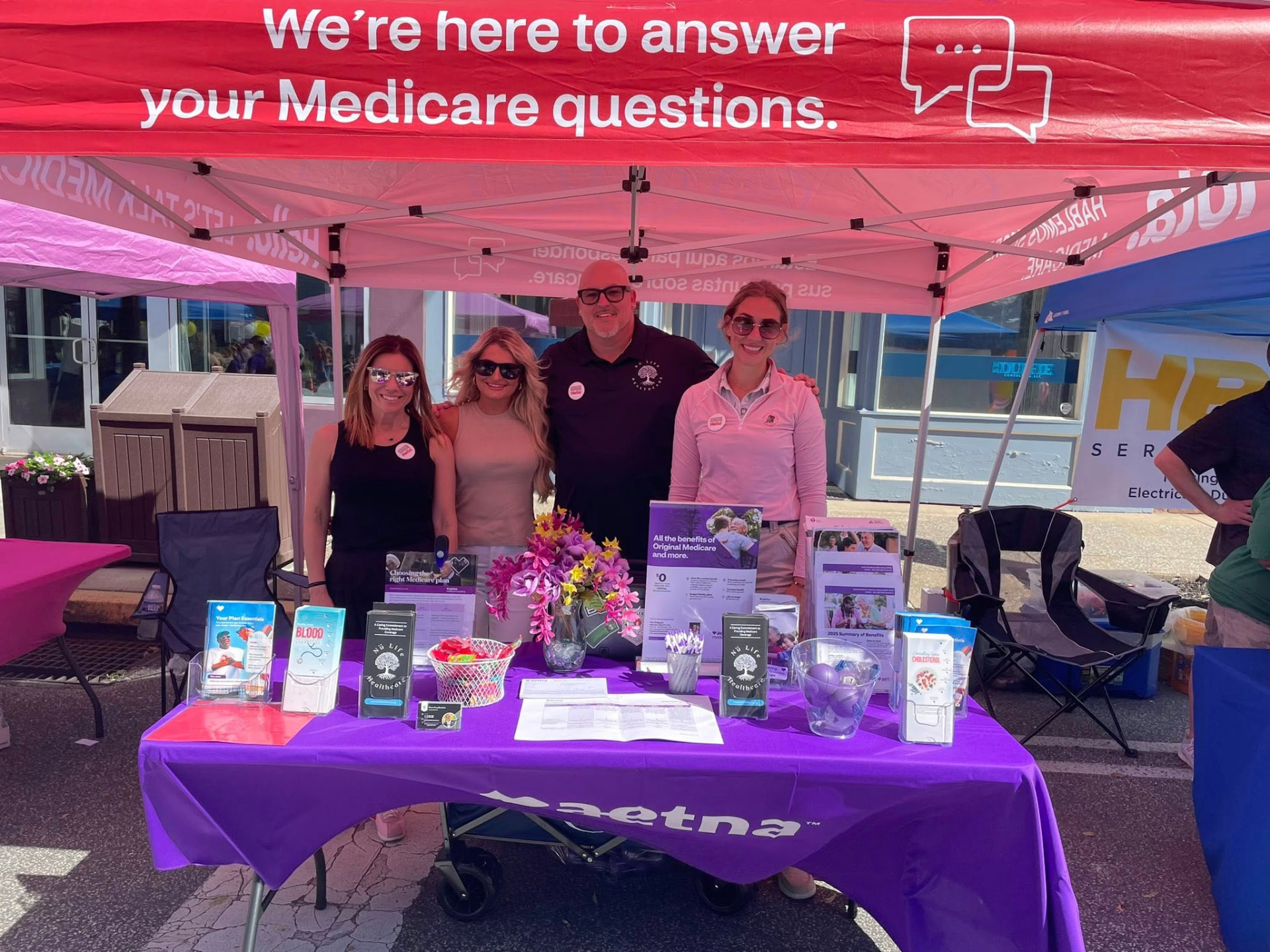 Nu Life Healthcare agents at a community Medicare question booth